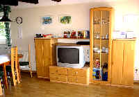 Wohnzimmer mit Laminat 